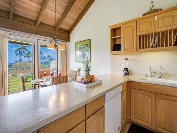 Luxury Poipu Kauai Vacation Rental  Ocean View Top-Floor Condo Near Brennecke’s Beach